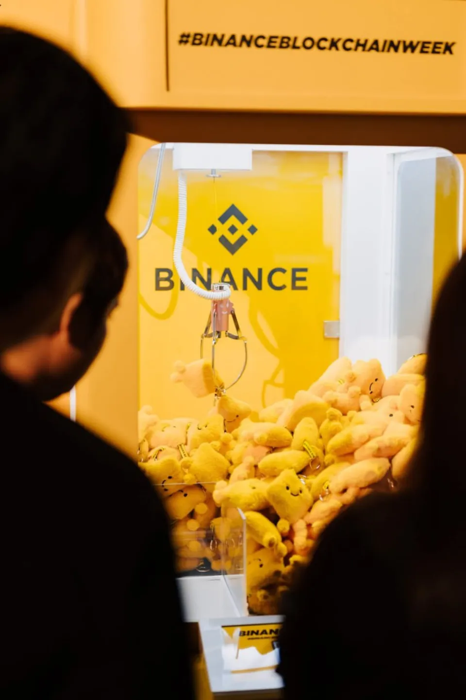 Binance claw machine with Bibi plushies